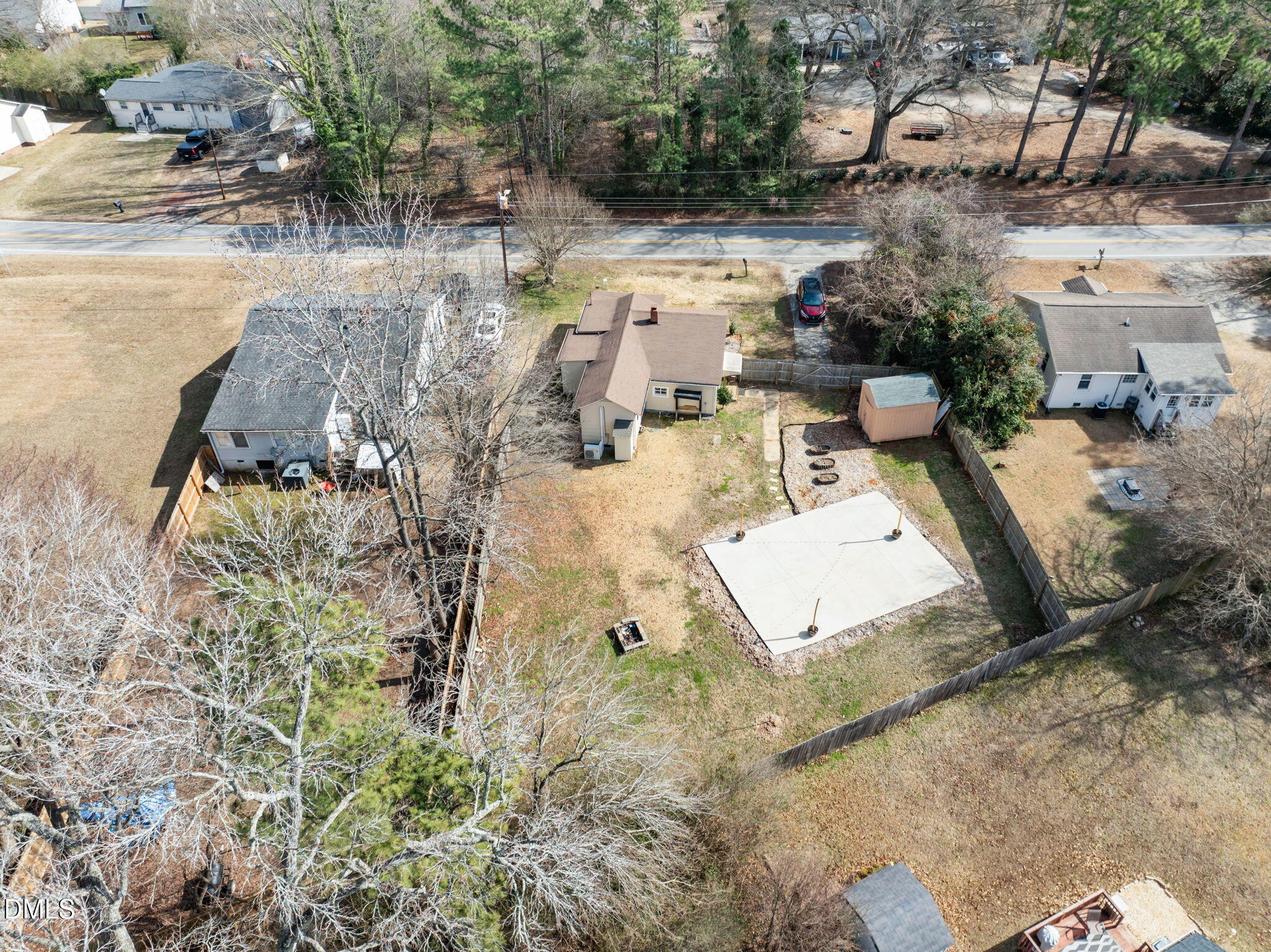 209 Weston Road Garner, NC 27529 - Photo 30 of 37 an aerial view of a house with yard and parking