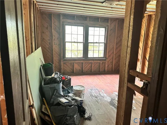 a room with furniture and a window