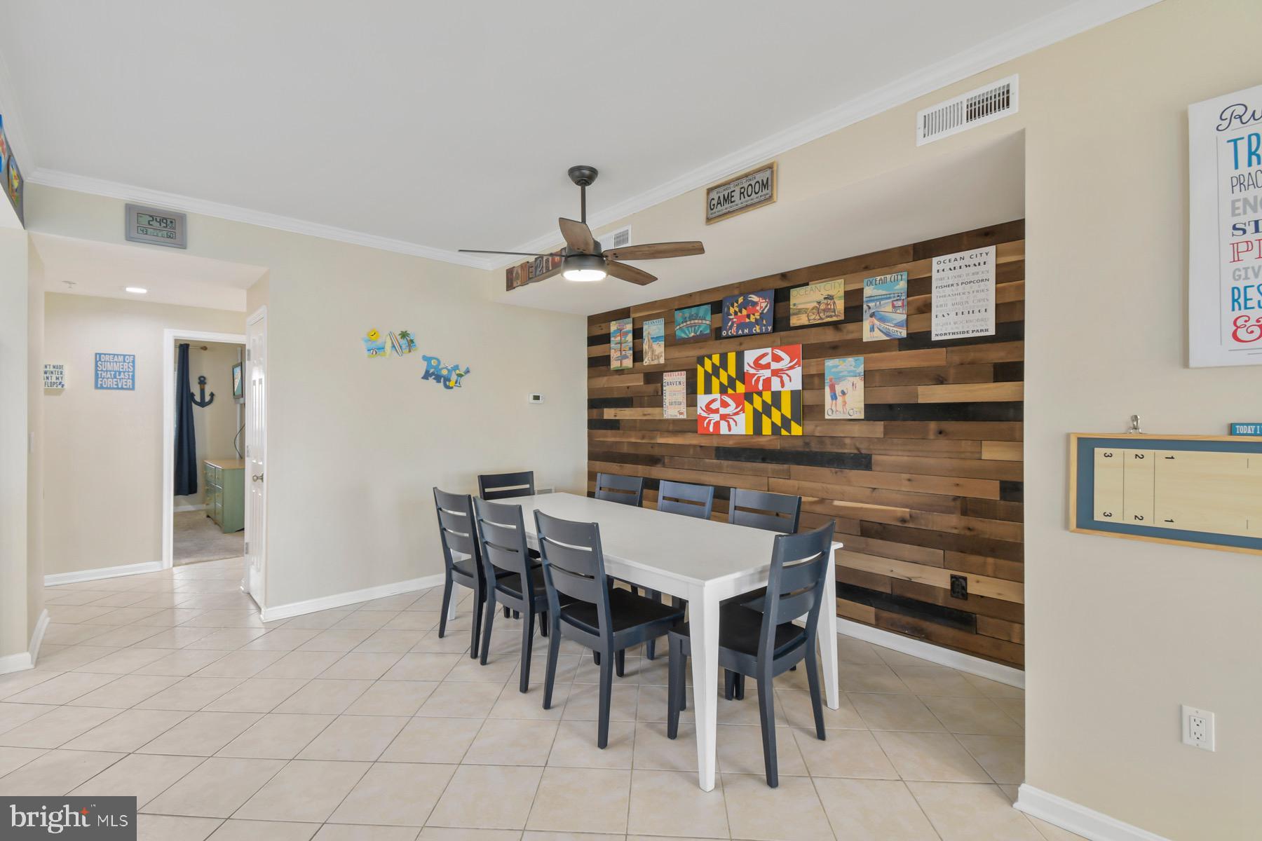 310 2nd Street, Unit 101 Ocean City, MD 21842 - Photo 12 of 37 a view of a dining area with furniture