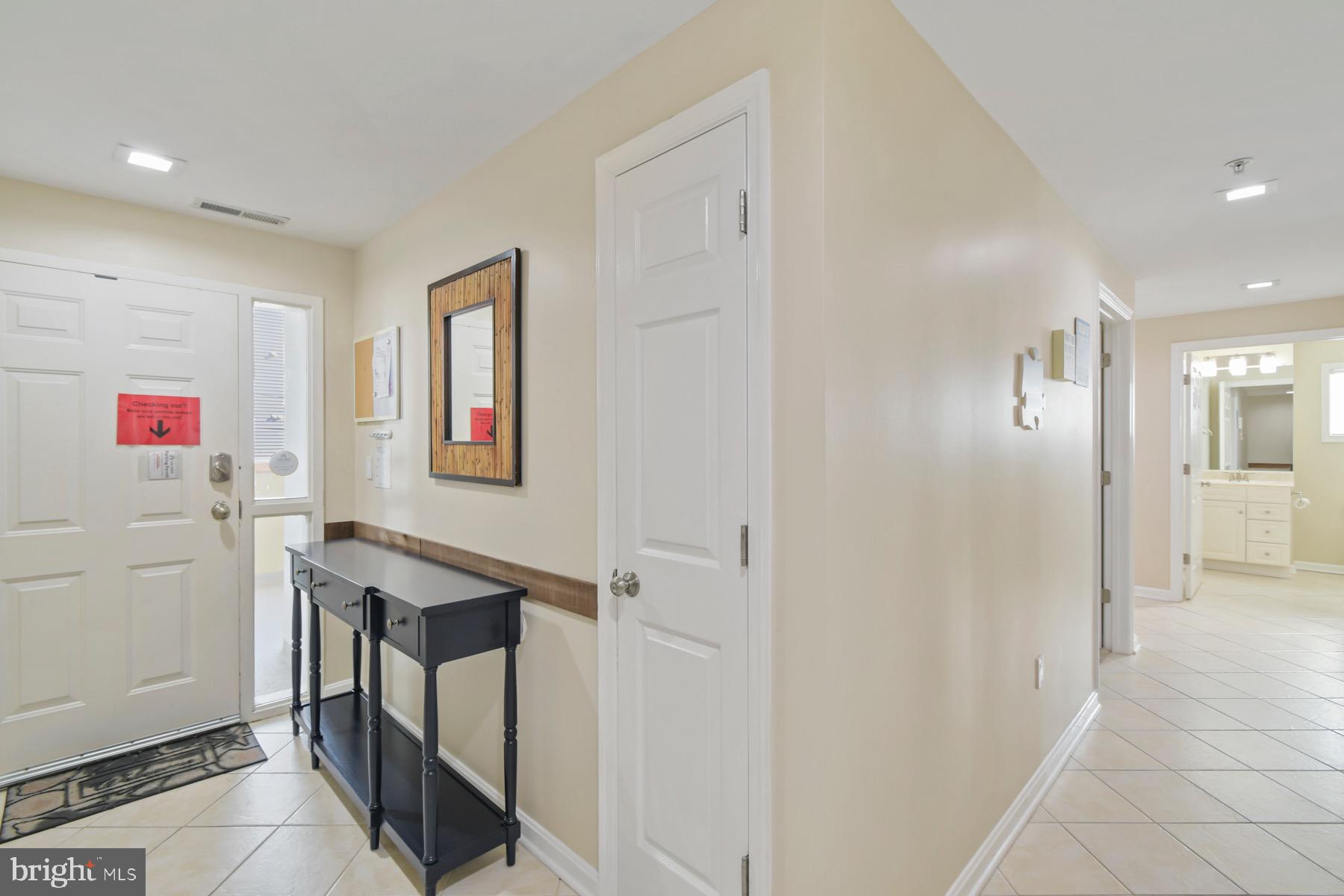 310 2nd Street, Unit 101 Ocean City, MD 21842 - Photo 25 of 37 a view of a hallway with workspace