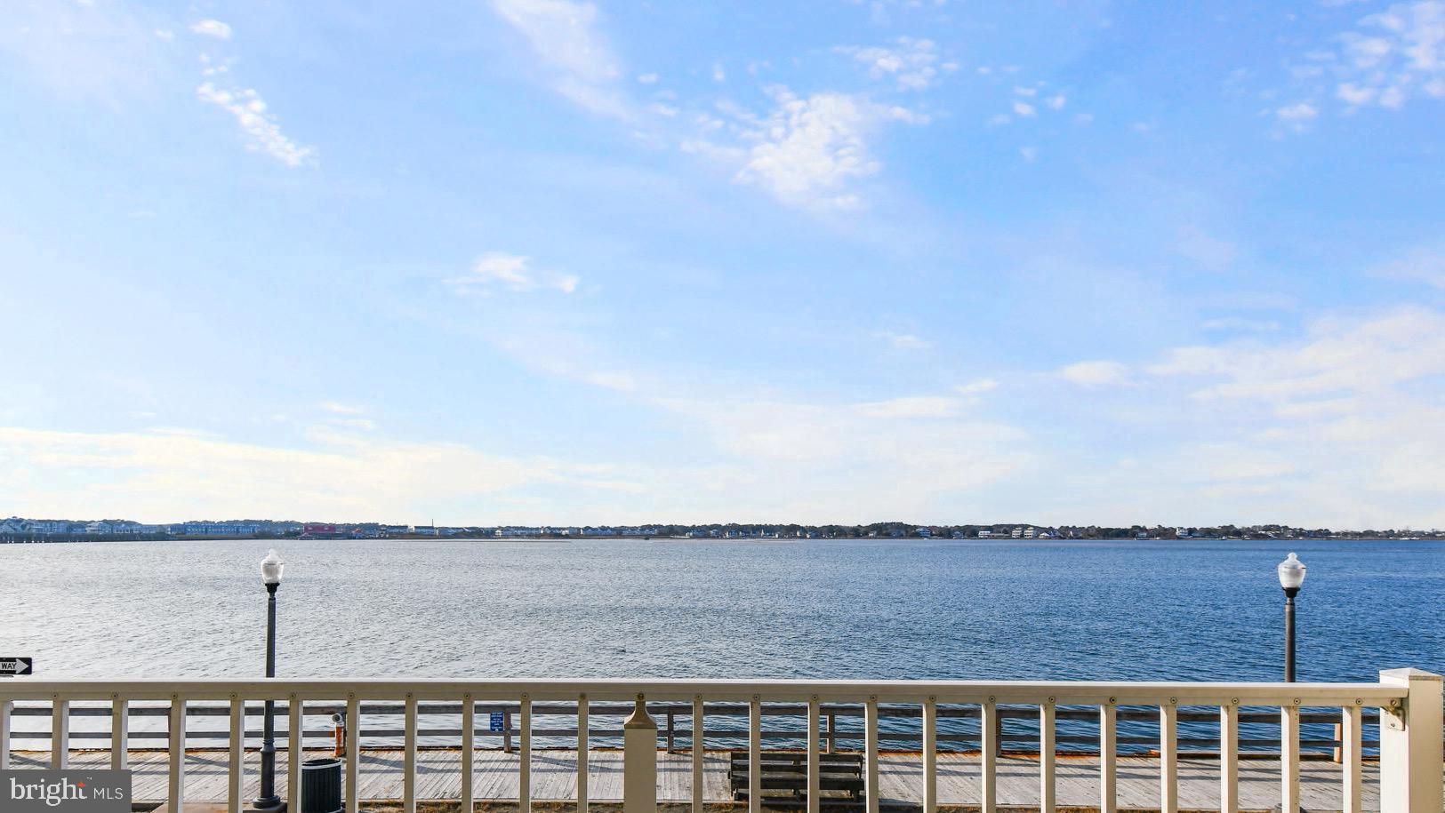 310 2nd Street, Unit 101 Ocean City, MD 21842 - Photo 26 of 37 a view of a city from a lake