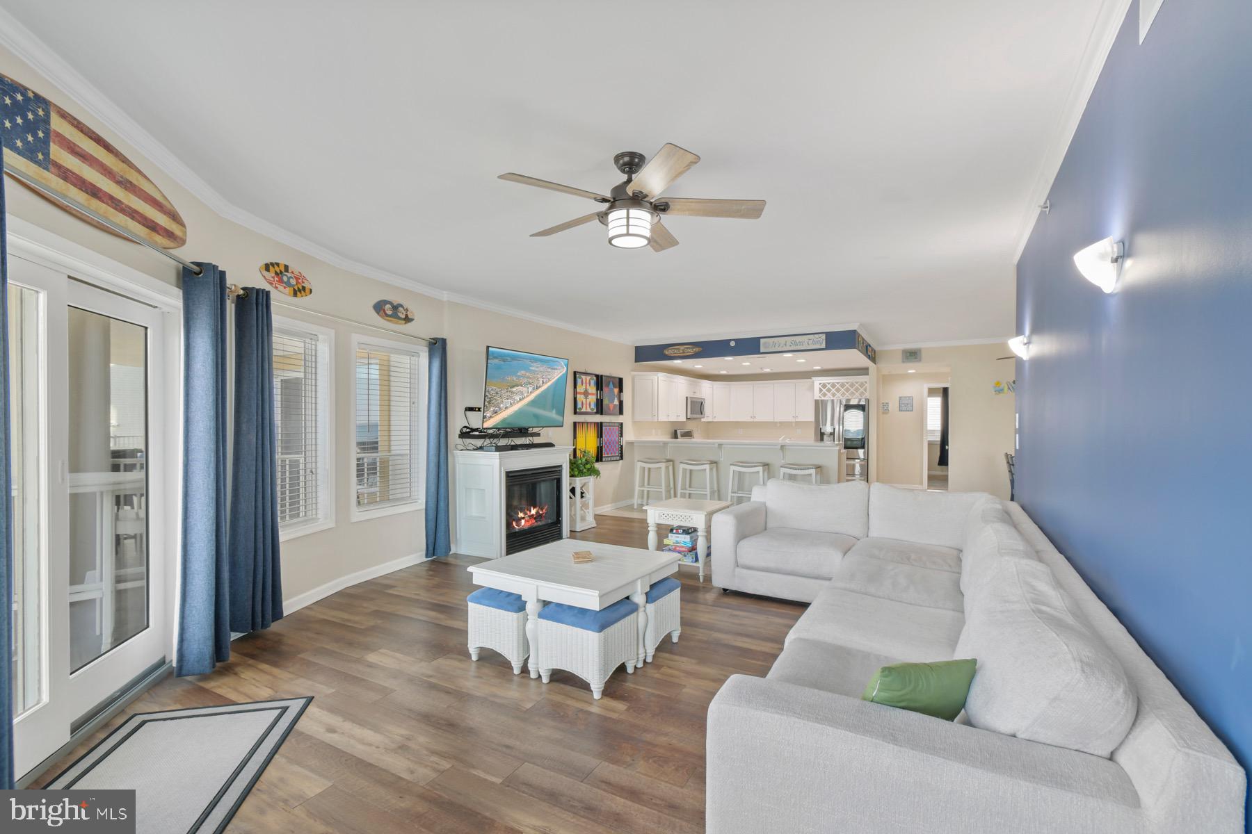 310 2nd Street, Unit 101 Ocean City, MD 21842 - Photo 7 of 37 a living room with furniture and a rug