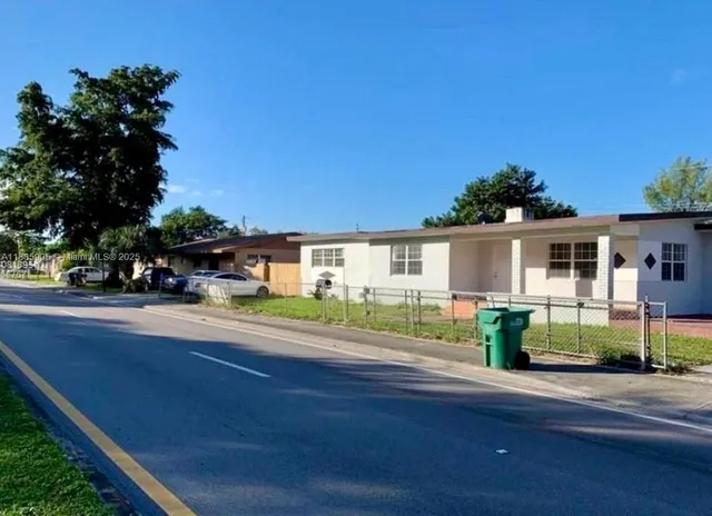 front view of house with a yard
