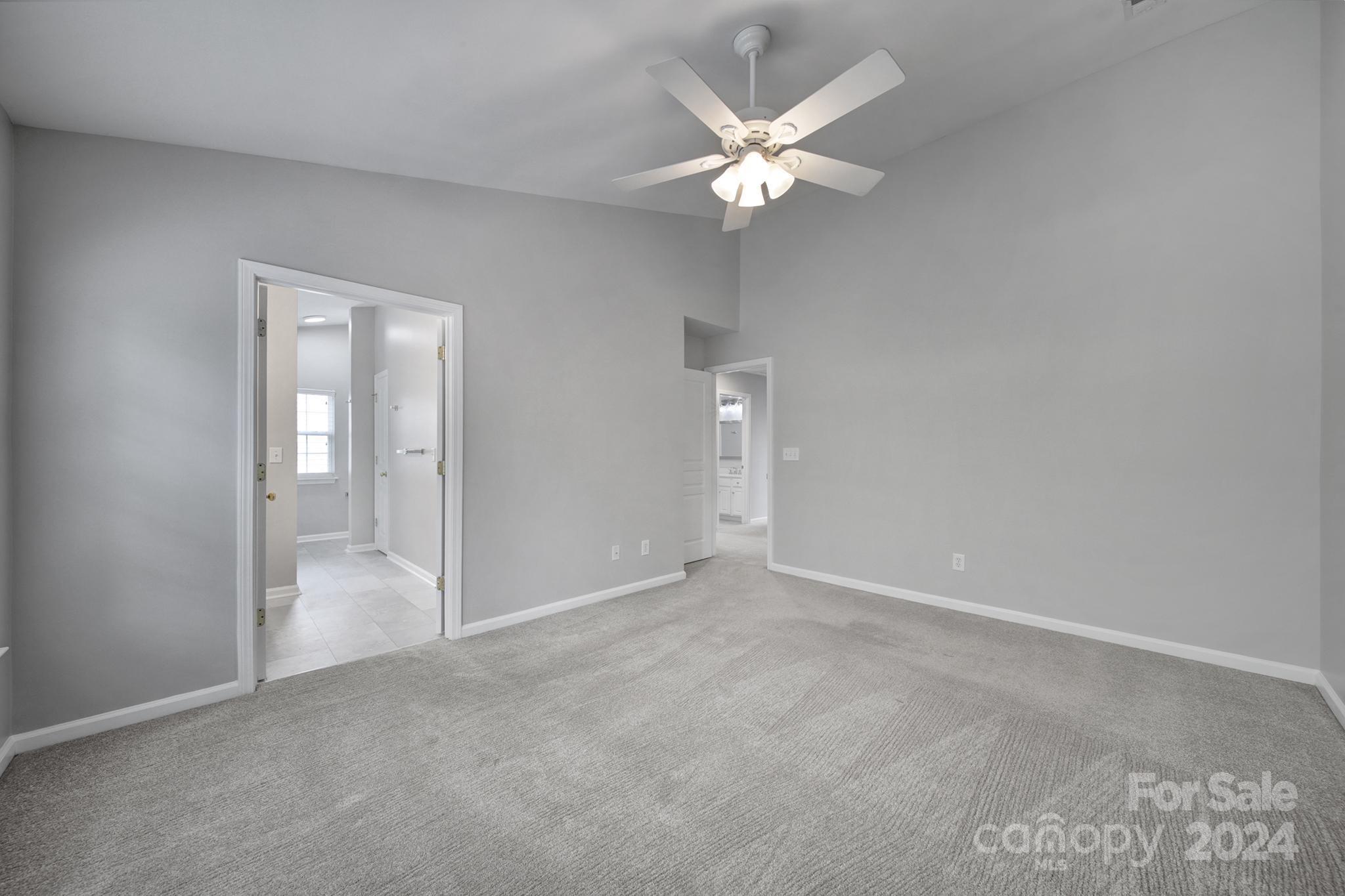 3305 Adair Marble Street Fort Mill, SC 29708 - Photo 18 of 38 an empty room with chandelier fan