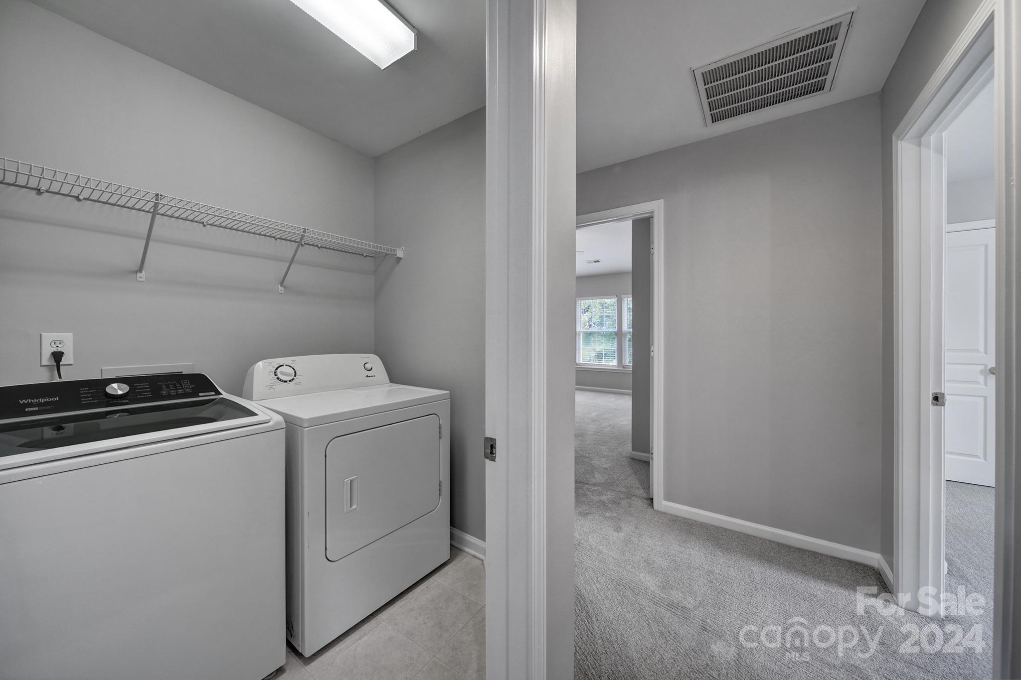 3305 Adair Marble Street Fort Mill, SC 29708 - Photo 24 of 38 a utility room with dryer and washer