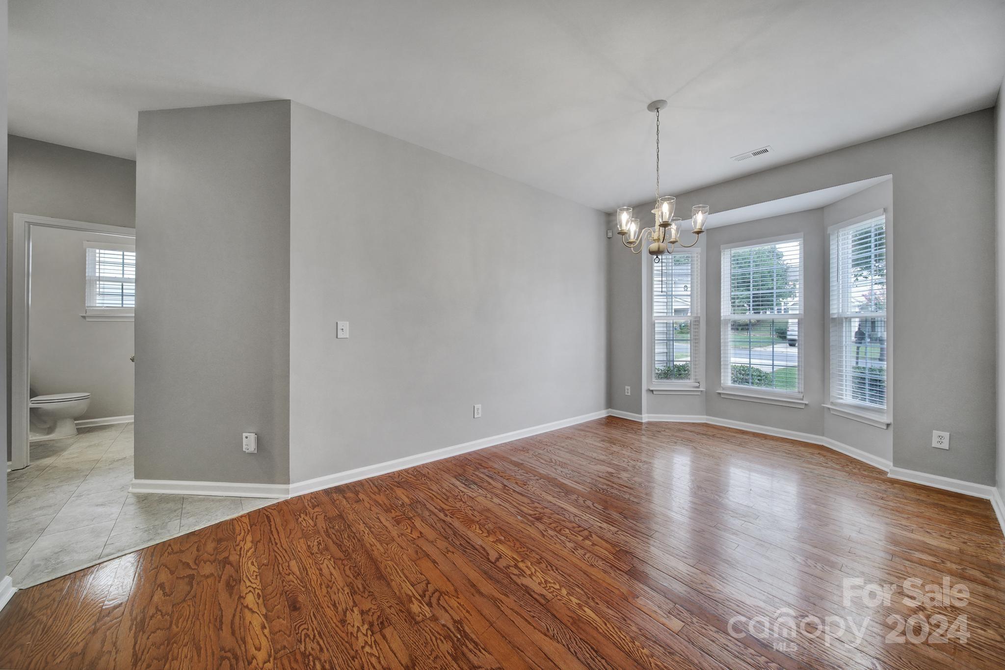 3305 Adair Marble Street Fort Mill, SC 29708 - Photo 3 of 38 a view of livingroom with window and hardwood floor