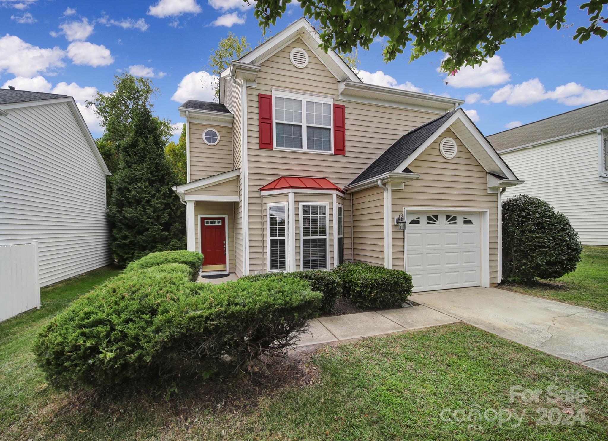 3305 Adair Marble Street Fort Mill, SC 29708 - Photo 35 of 38 a front view of a house with garden