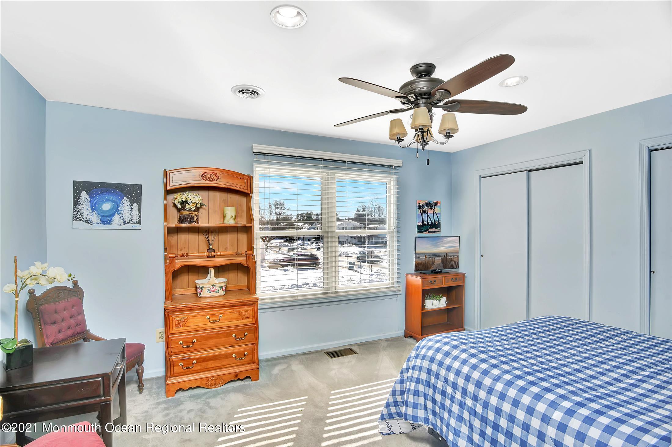 63 Hedgewood Road Howell, NJ 07731 - Photo 14 of 25 a bedroom with a bed and a window