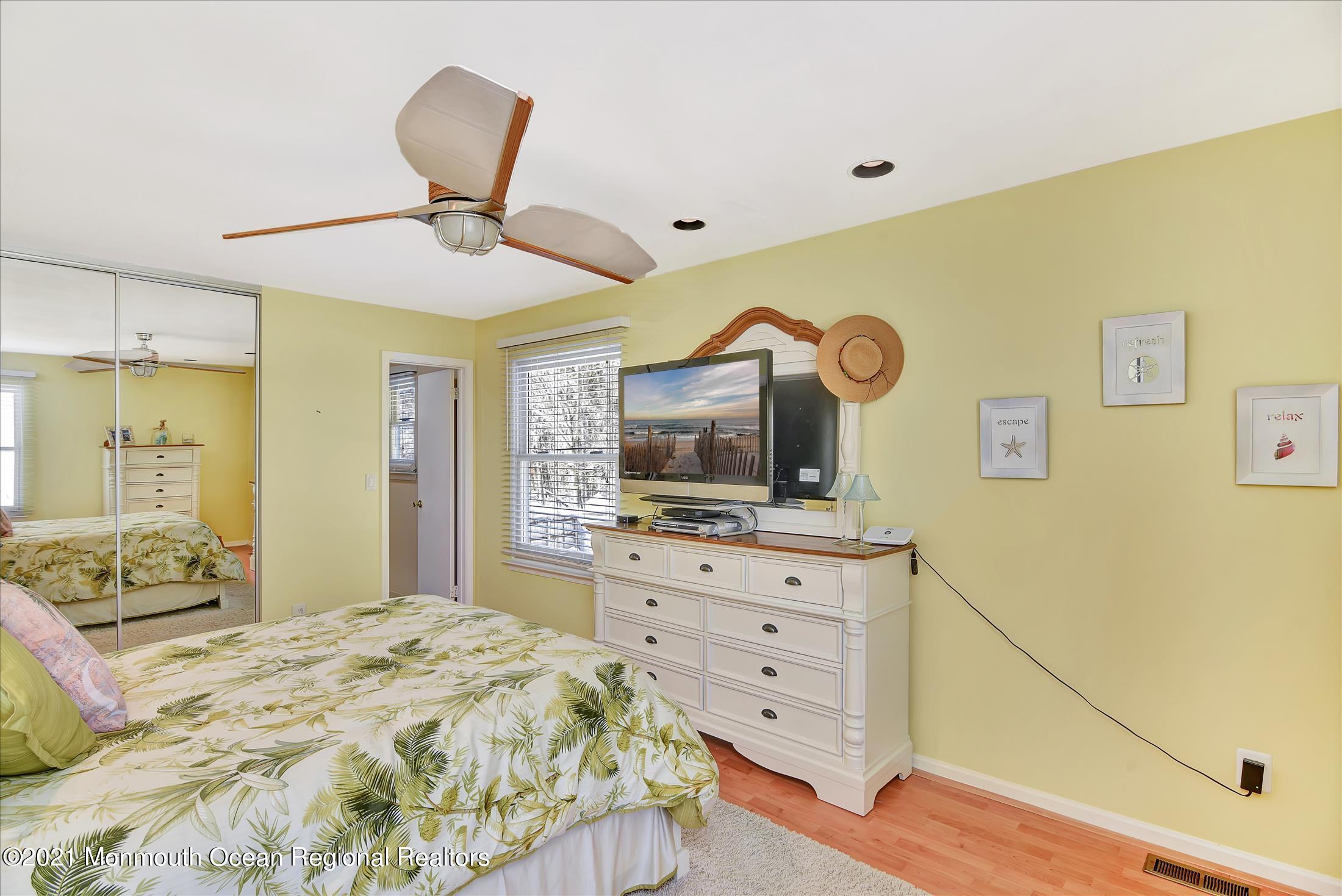 63 Hedgewood Road Howell, NJ 07731 - Photo 19 of 25 a bedroom with a bed and wooden floor