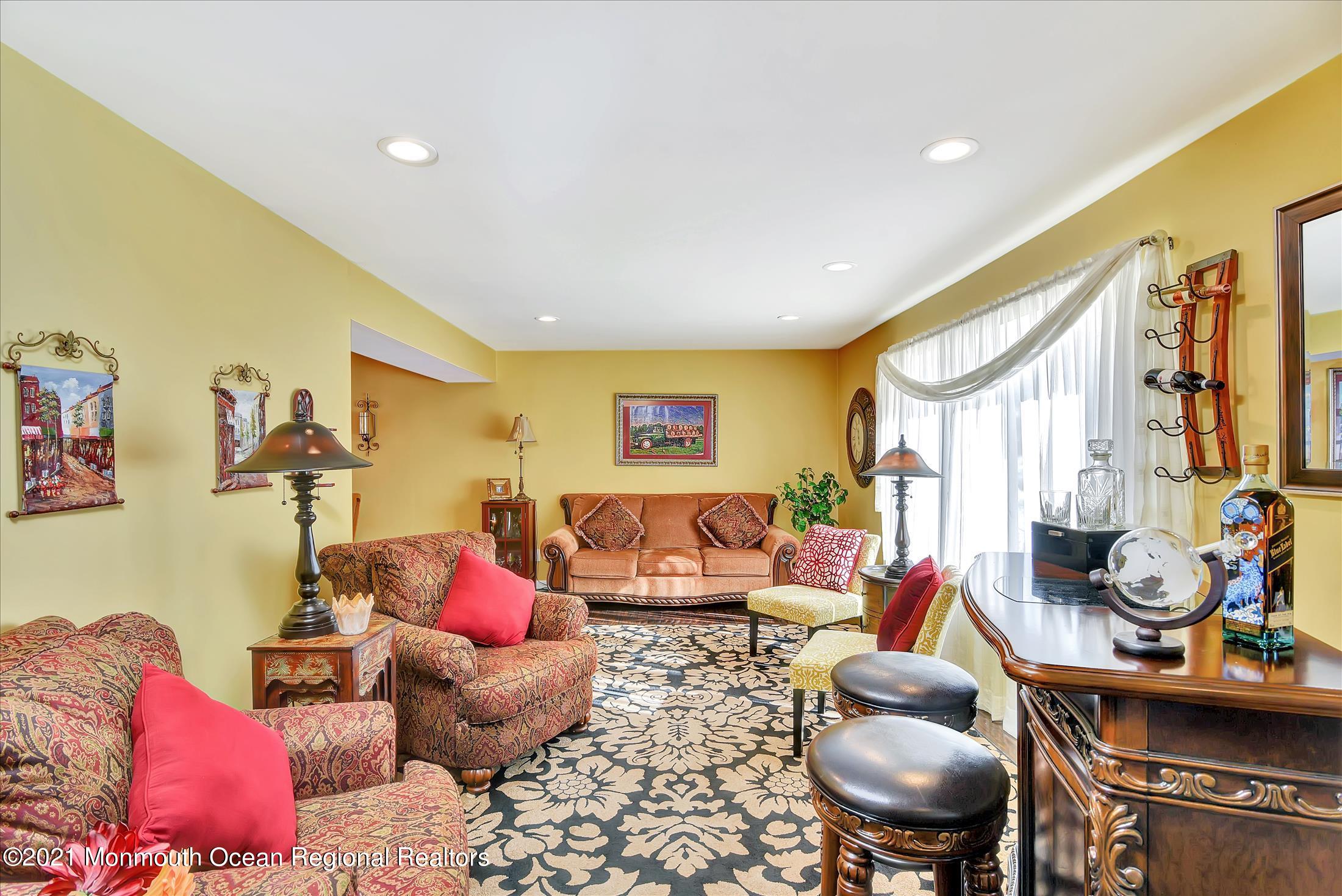 63 Hedgewood Road Howell, NJ 07731 - Photo 3 of 25 a living room with furniture and a window