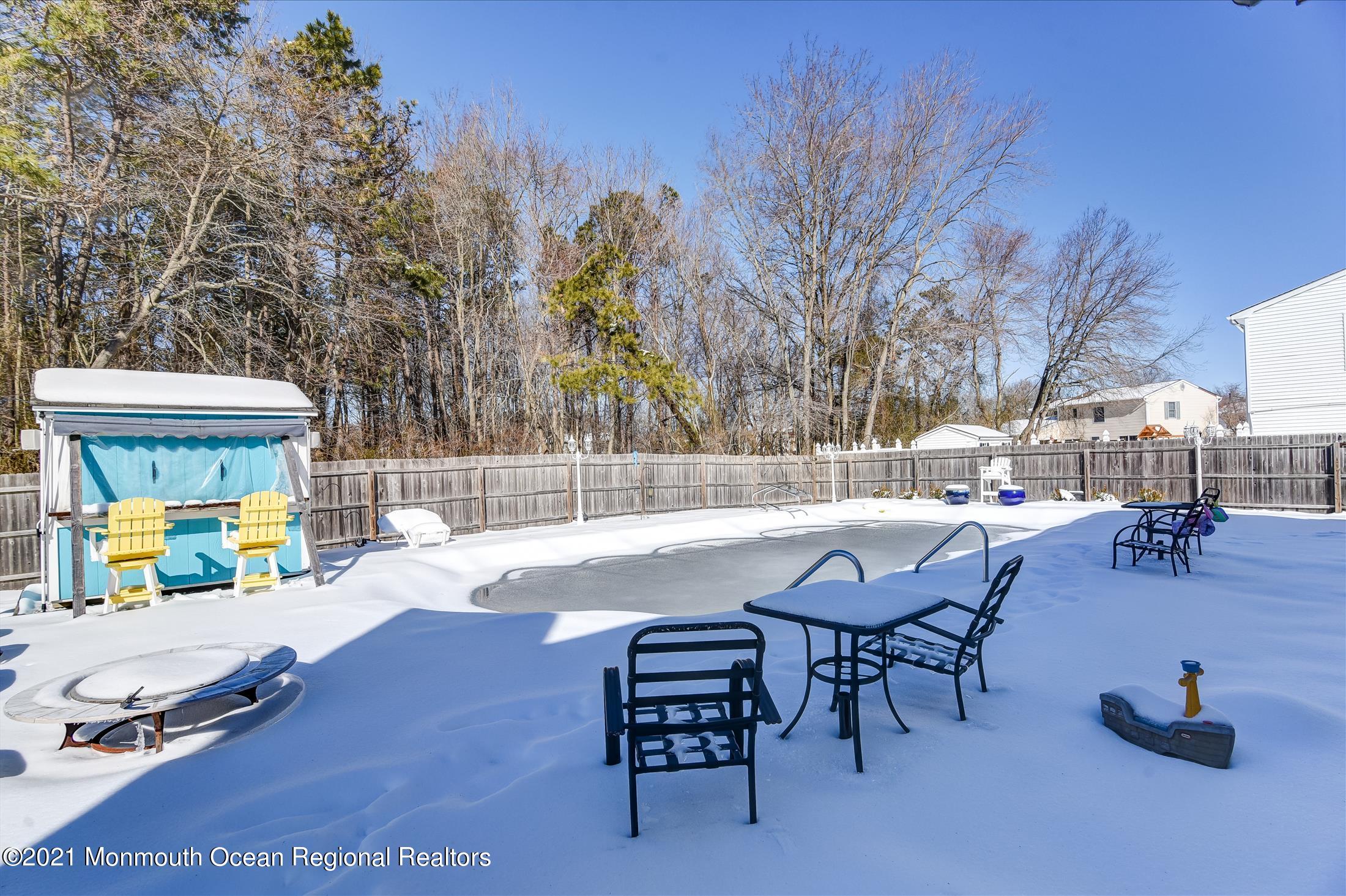 63 Hedgewood Road Howell, NJ 07731 - Photo 22 of 25 a view of outdoor space yard deck and outdoor seating