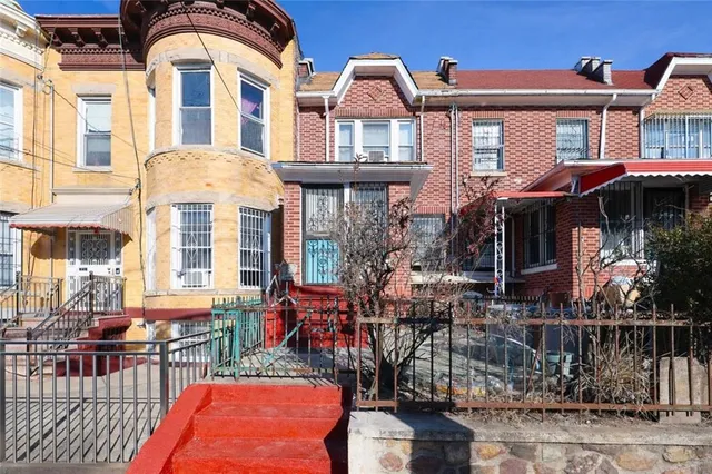 a front view of a house with a patio