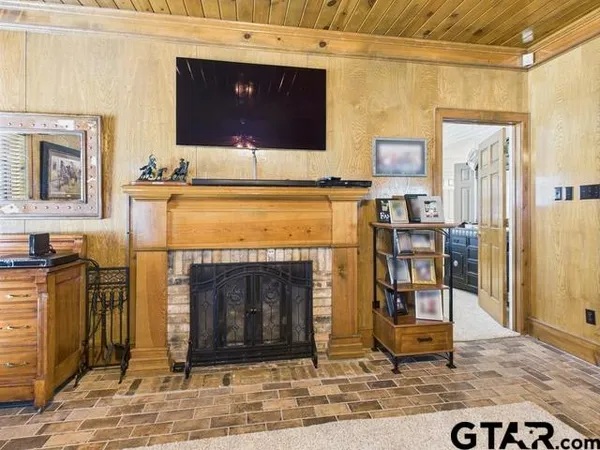 a living room with fireplace