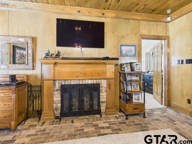 a living room with fireplace