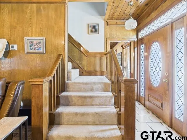 a bed room with a bed and a couch