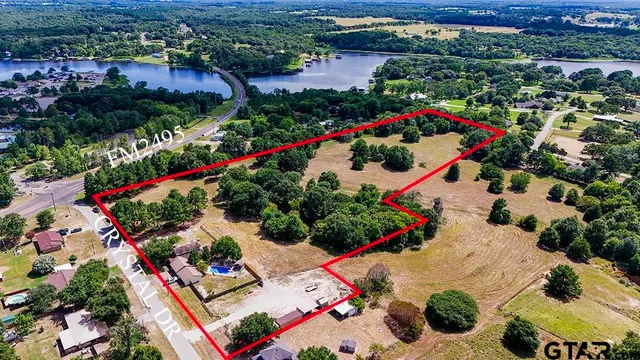 an aerial view of a house swimming pool and outdoor seating