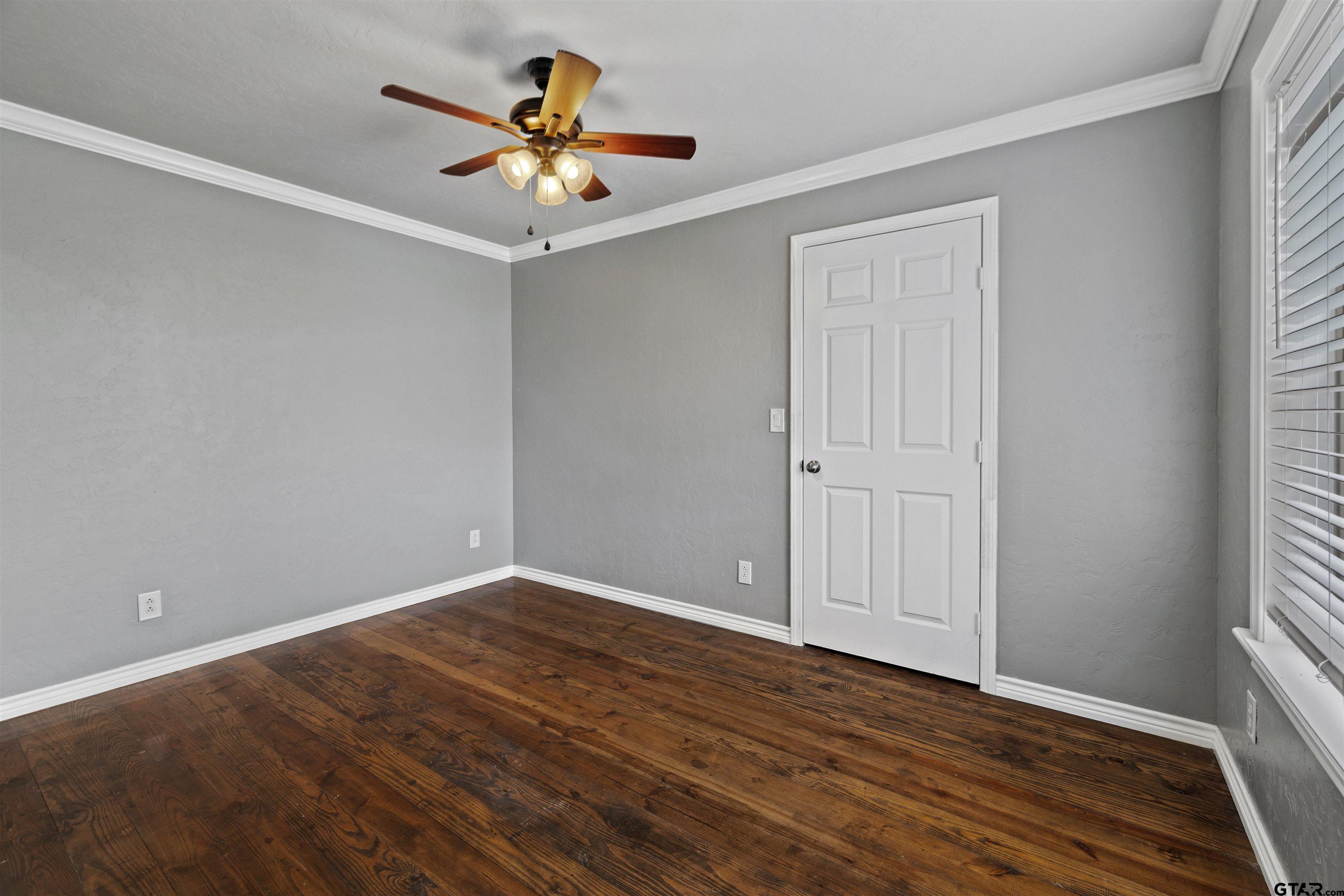 5796 Highway 271 Pittsburg, TX 75686 - Photo 20 of 43 a view of an empty room with a window
