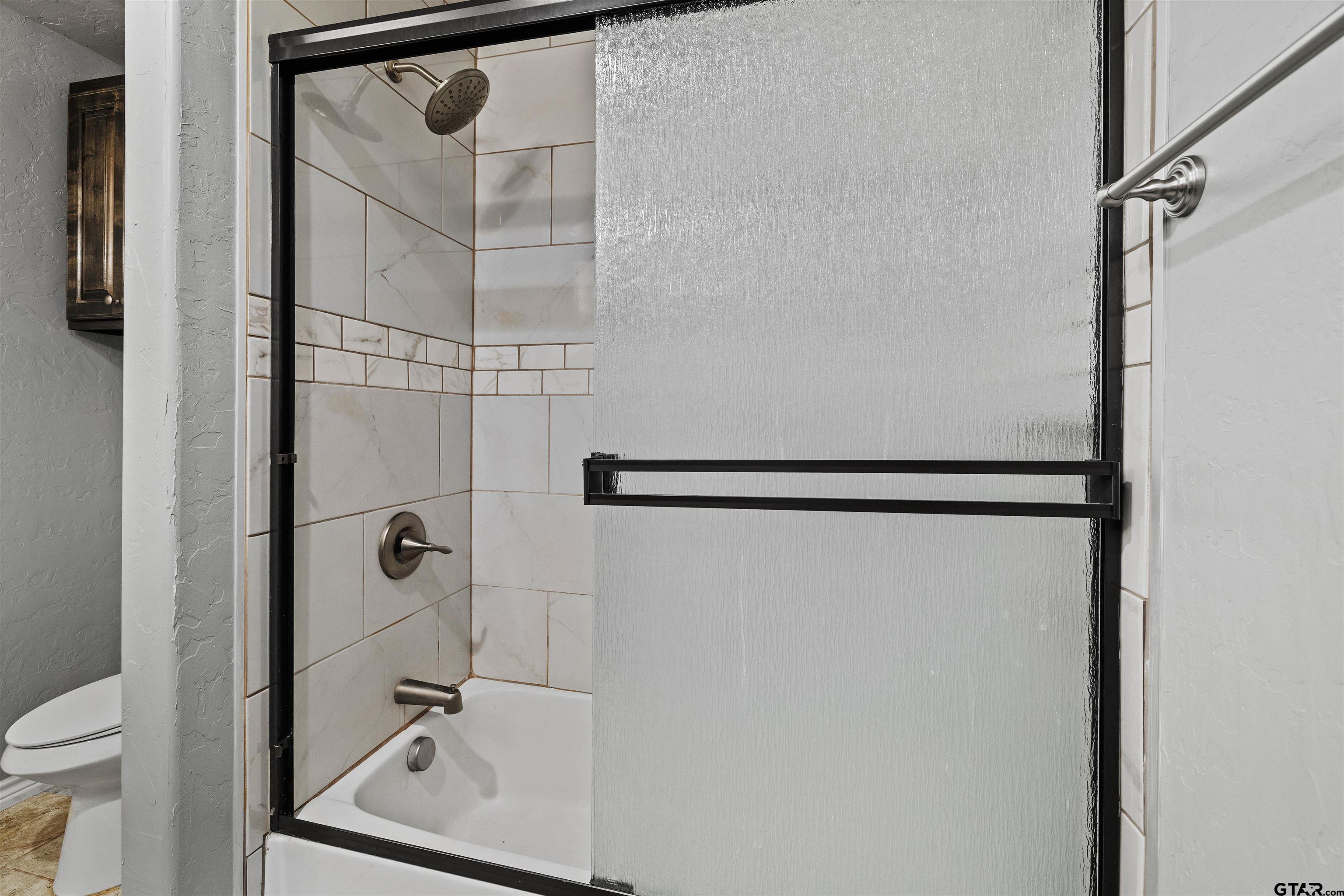 5796 Highway 271 Pittsburg, TX 75686 - Photo 21 of 43 a bathroom with a shower