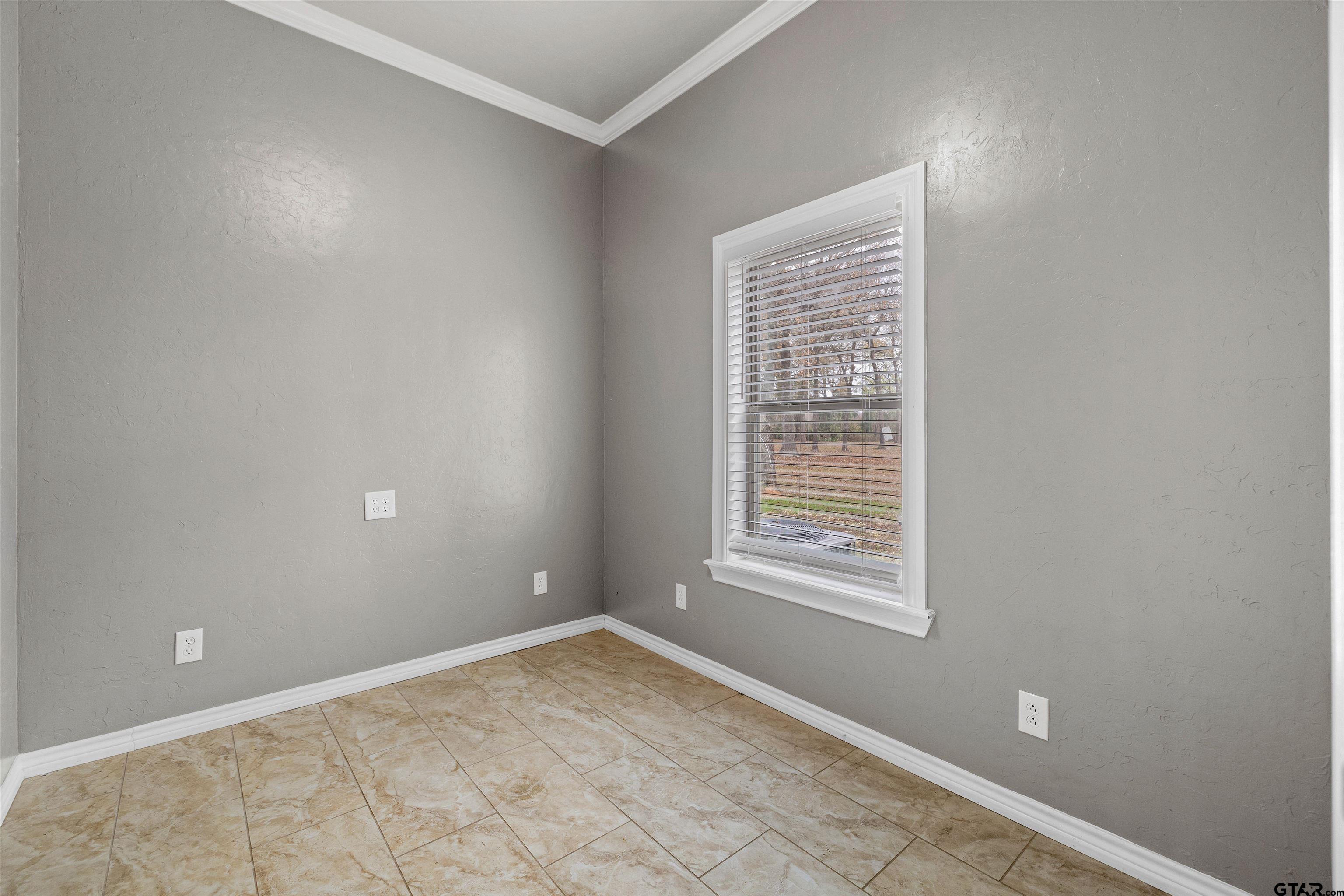 5796 Highway 271 Pittsburg, TX 75686 - Photo 22 of 43 a view of an empty room with a window