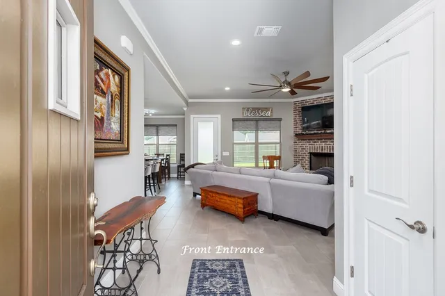 a living room with furniture and a window