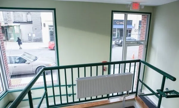 a view of balcony with furniture