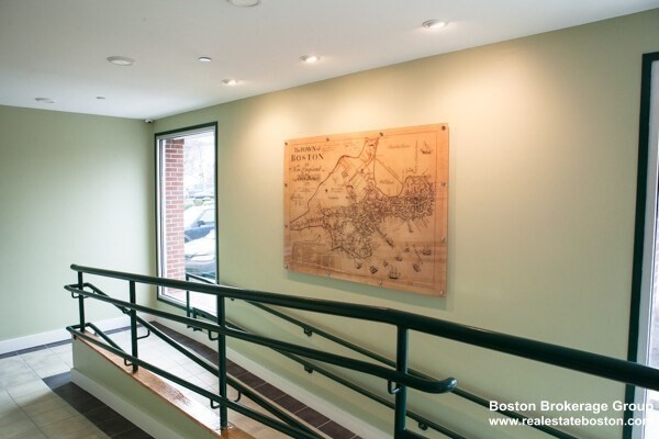 10 Roxbury Street, Unit 10 Boston, MA 02119 - Photo 7 of 8 a view of a hallway