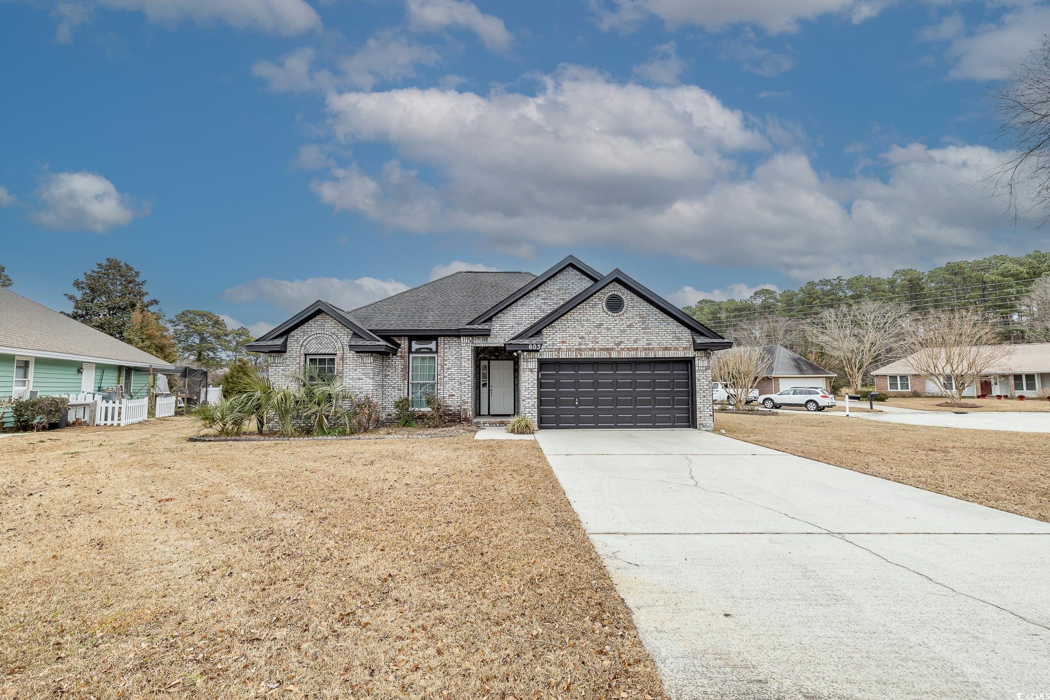 603 Hatteras River Road Myrtle Beach, SC 29588 - Photo 3 of 22 View of front of property with a front yard and a