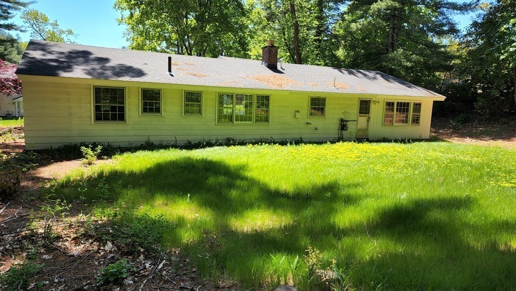 27 Janet Road Chelmsford, MA 01824 - Photo 2 of 13 a view of house with garden