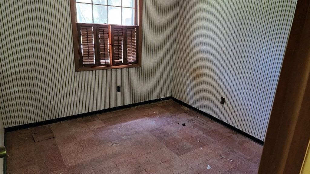 27 Janet Road Chelmsford, MA 01824 - Photo 5 of 13 a view of a room that has a window in it