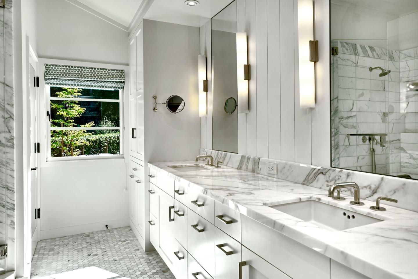 2091 Portola Road Woodside, CA 94062 - Photo 23 of 37 a bathroom with a granite countertop sink and a mirror