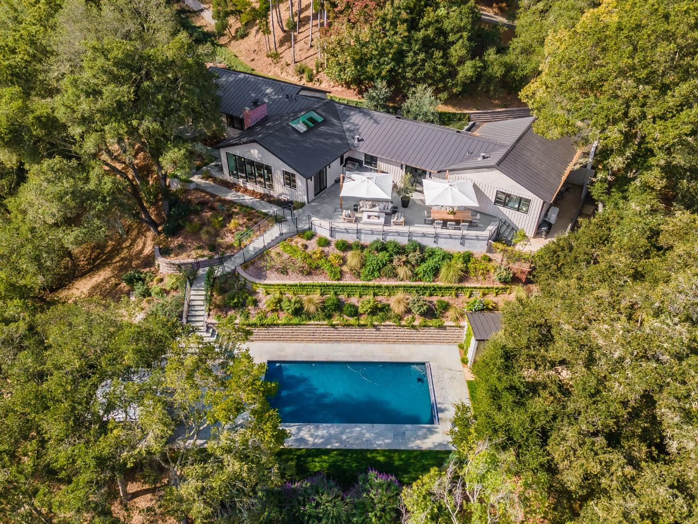 2091 Portola Road Woodside, CA 94062 - Photo 33 of 37 an aerial view of a house with a yard and garden