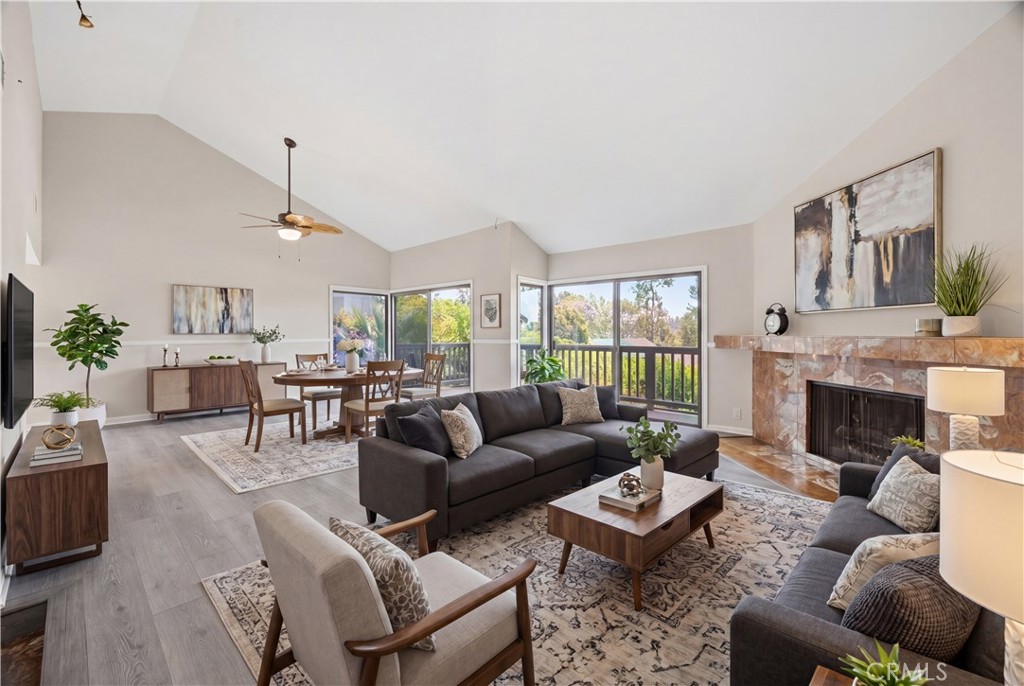 3 Palos, Unit 51 Irvine, CA 92612 - Photo 1 of 40 The light and bright living room and dining room with brand-new luxury floor, fresh paint and brand-new ceiling fan/light. Virtually staged.