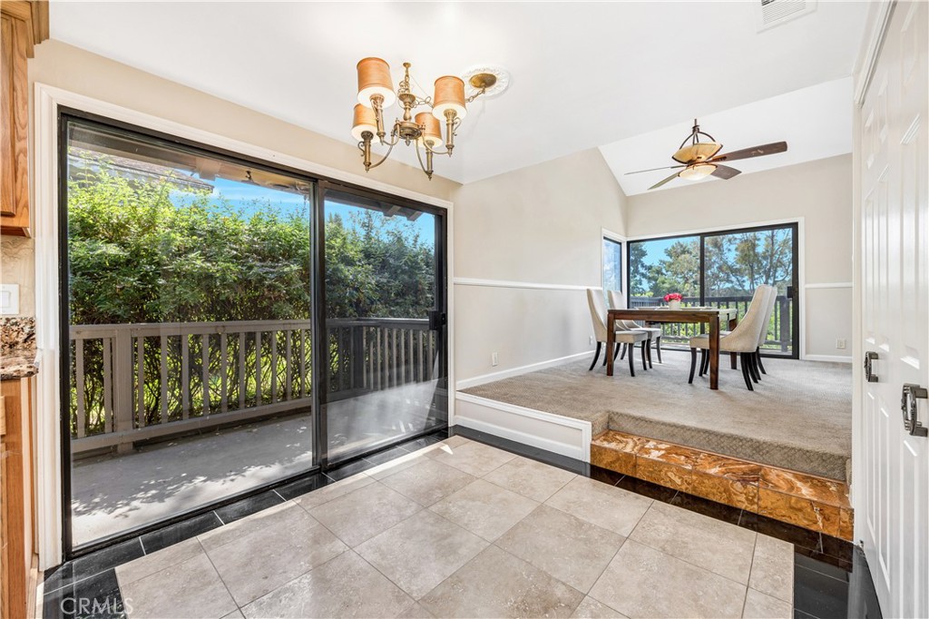 3 Palos, Unit 51 Irvine, CA 92612 - Photo 18 of 54 The breakfast nook area with another set of sliding door leading to the first balcony.