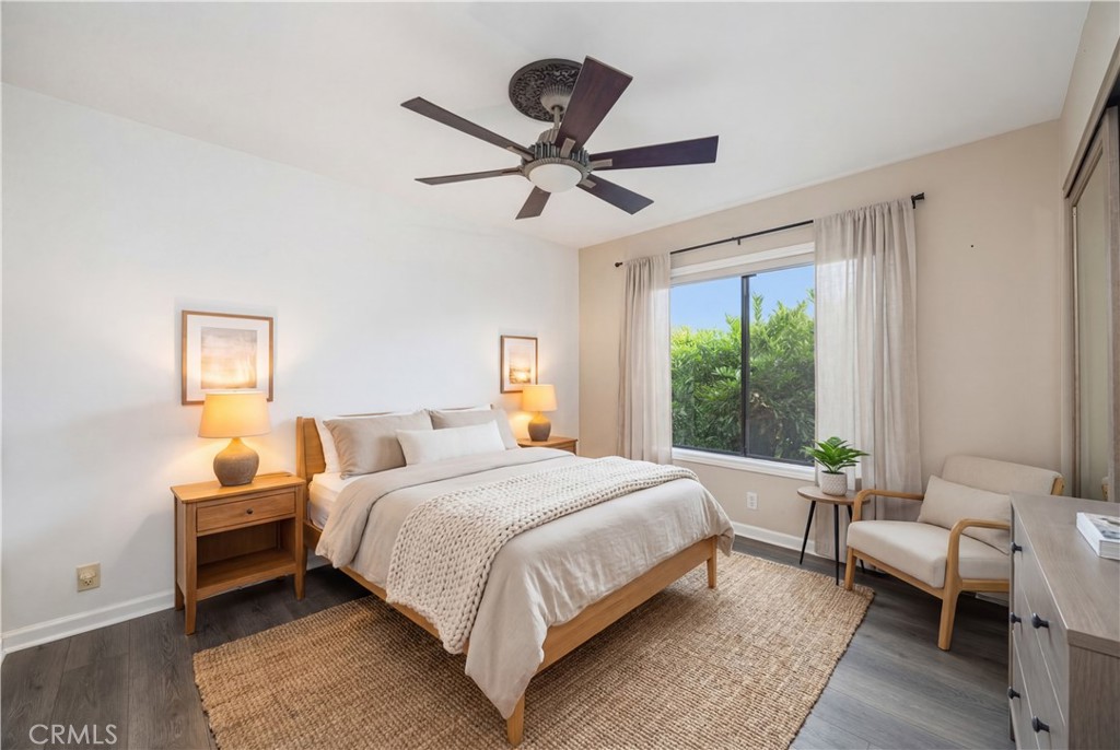 3 Palos, Unit 51 Irvine, CA 92612 - Photo 18 of 40 The second bedroom is freshly painted with virtual staging. The beautiful plants outside the window provide not only the privacy, but also create a calming environment.
