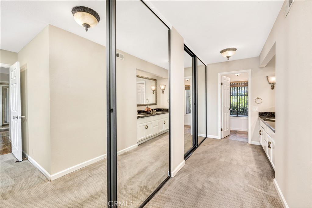 3 Palos, Unit 51 Irvine, CA 92612 - Photo 30 of 54 Dual vanities are on the right side.