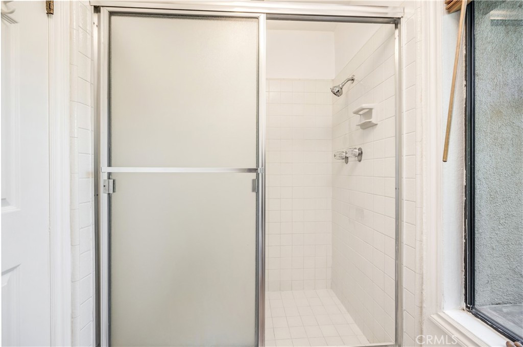 3 Palos, Unit 51 Irvine, CA 92612 - Photo 35 of 54 Walk-in shower in the primary bathroom.