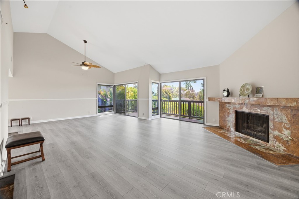3 Palos, Unit 51 Irvine, CA 92612 - Photo 35 of 40 The original picture of the living room and dining room. Spacious with high ceiling and bright will 2 sets of sliding doors and 2 additional windows.