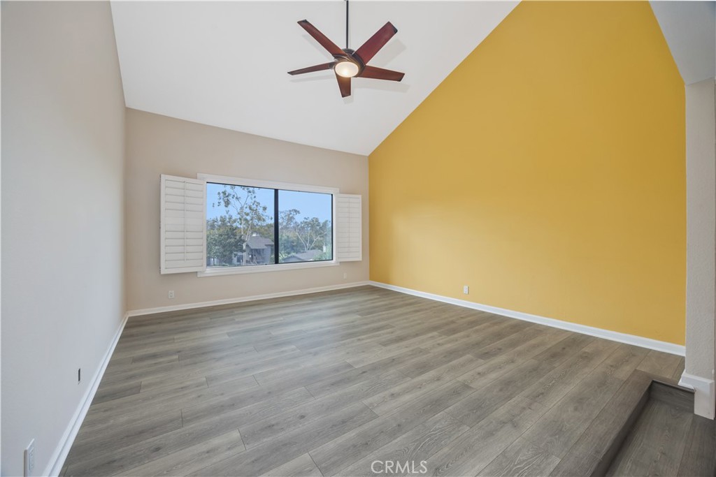 3 Palos, Unit 51 Irvine, CA 92612 - Photo 40 of 40 The yellow wall is gone. The entire primary bedroom has the same color paint as in the picture with virtual staging.