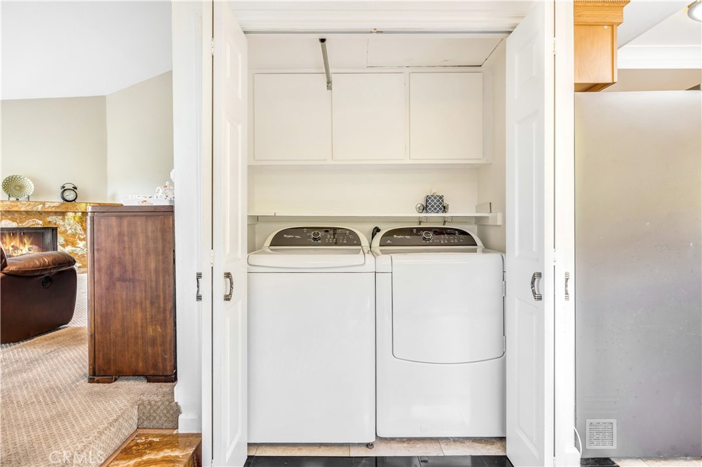 3 Palos, Unit 51 Irvine, CA 92612 - Photo 7 of 40 Washer and dryer are included inside a closet.