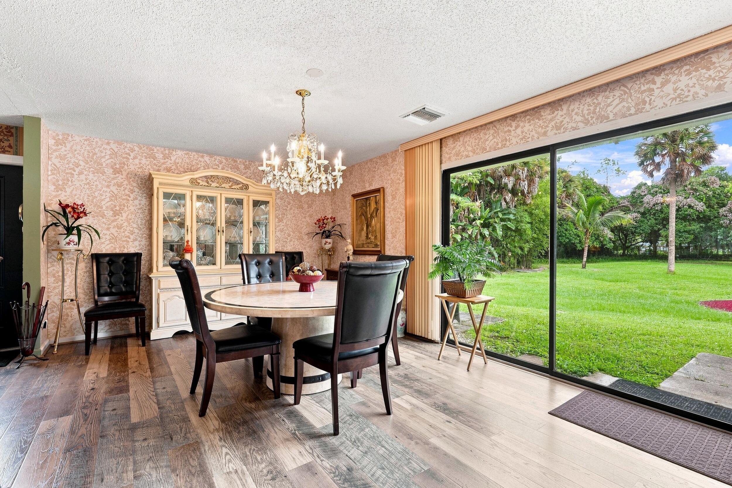 12871 Compton Road Loxahatchee Groves, FL 33470 - Photo 14 of 51 Dining Area & Backyard View