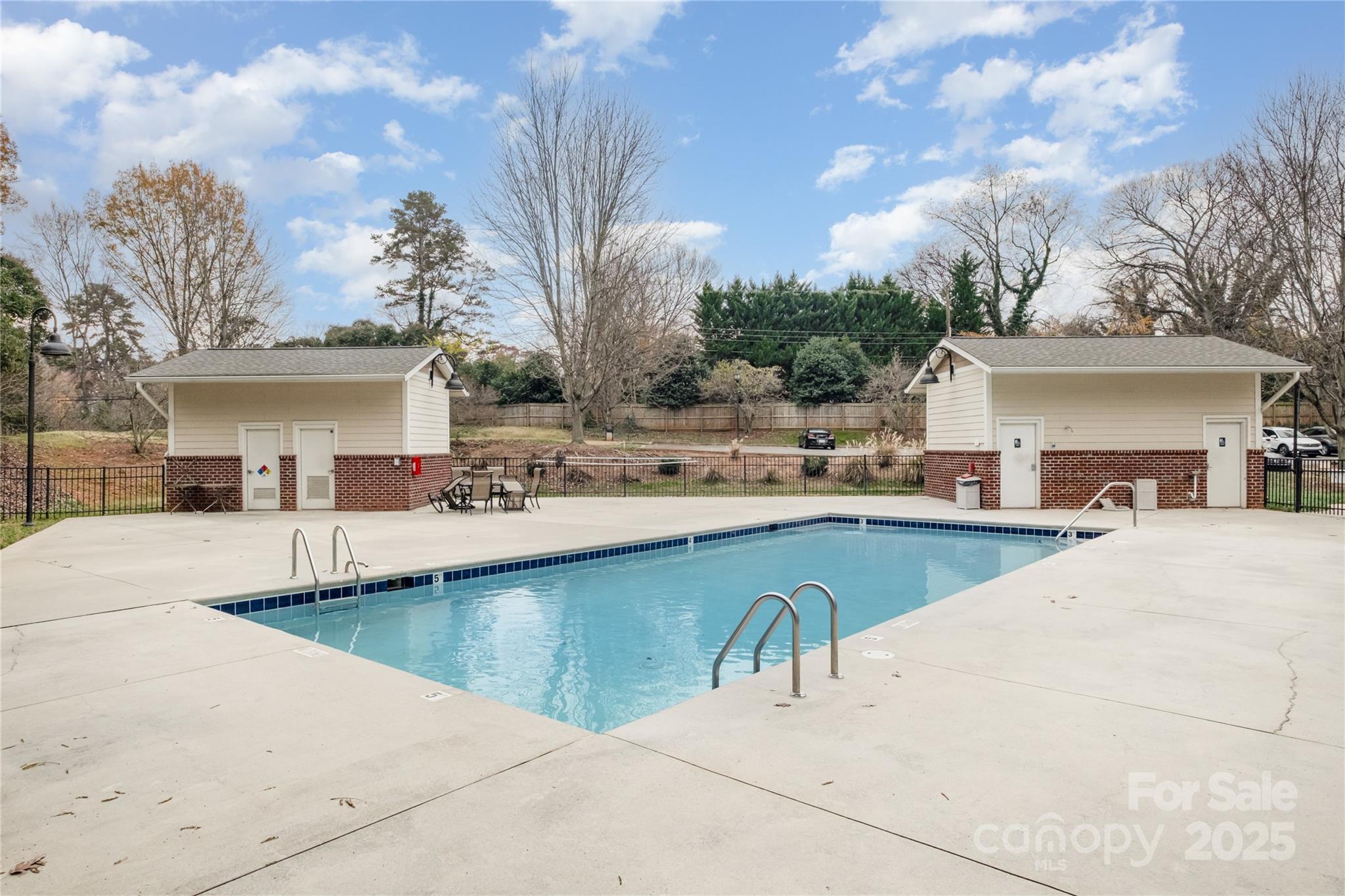 1000 East Woodlawn Road, Unit 217 Charlotte, NC 28209 - Photo 19 of 19 a view of a house with outdoor kitchen
