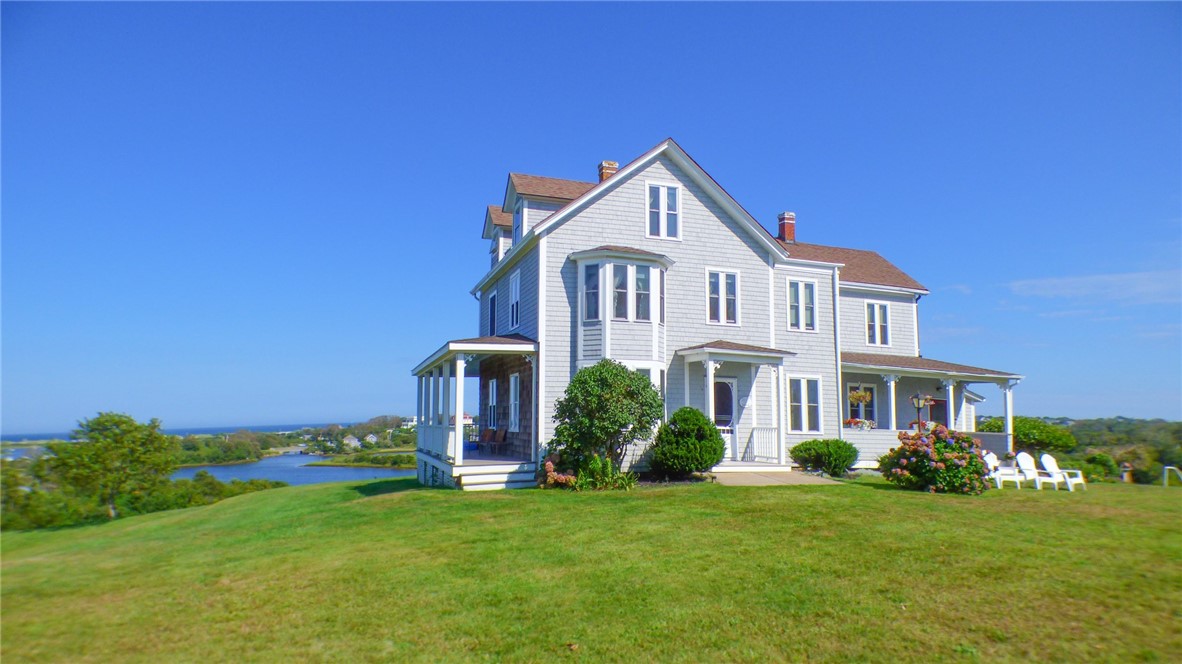 539 Center Road Block Island, RI 02807 - Photo 29 of 43 front of house with views of Trim's Pond and Atlantic Ocean - apartment porch on left