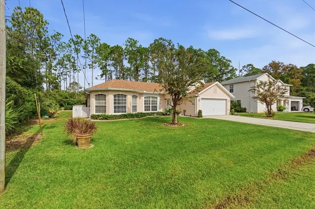 $399,900 | 48 Wheeling Lane, Palm Coast, FL 32164