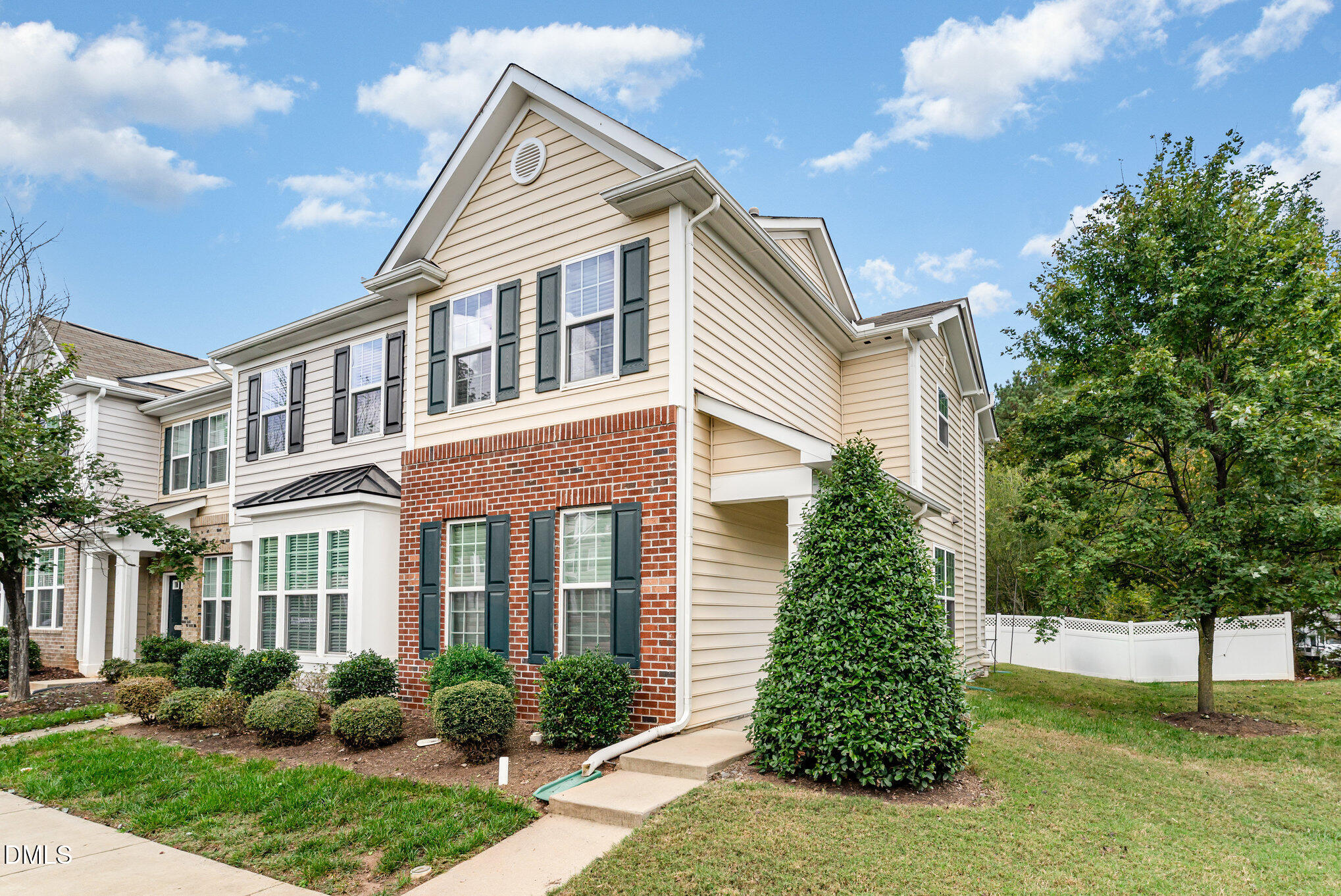 728 Cupola Drive Raleigh, NC 27603 - Photo 22 of 23 a front view of a house with a garden