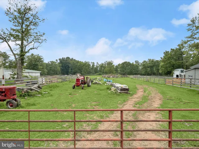 a view of a garden with houses