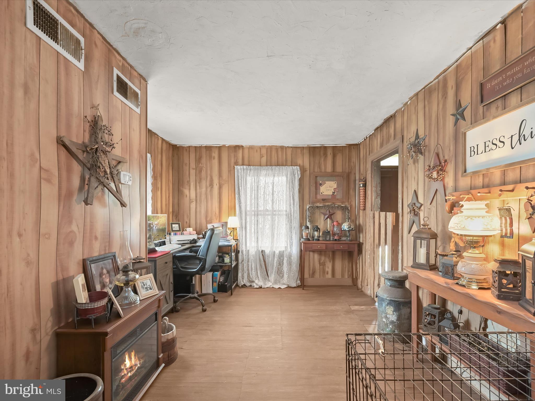 430 Bucher John Road Union Bridge, MD 21791 - Photo 21 of 40 a living room with furniture and large windows
