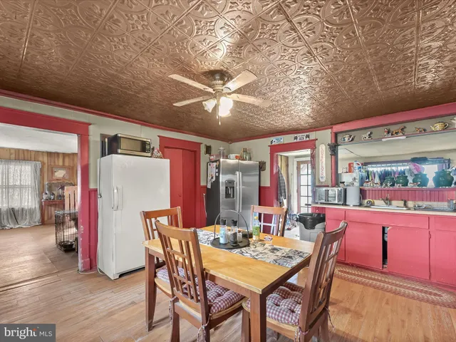 a view of a dining room with furniture