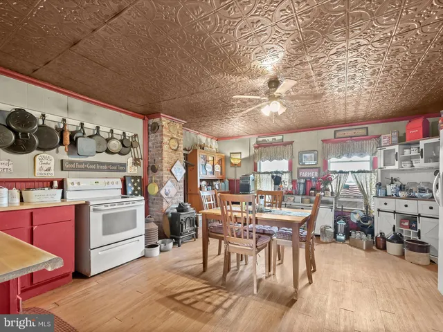 a view of a kitchen and dining room