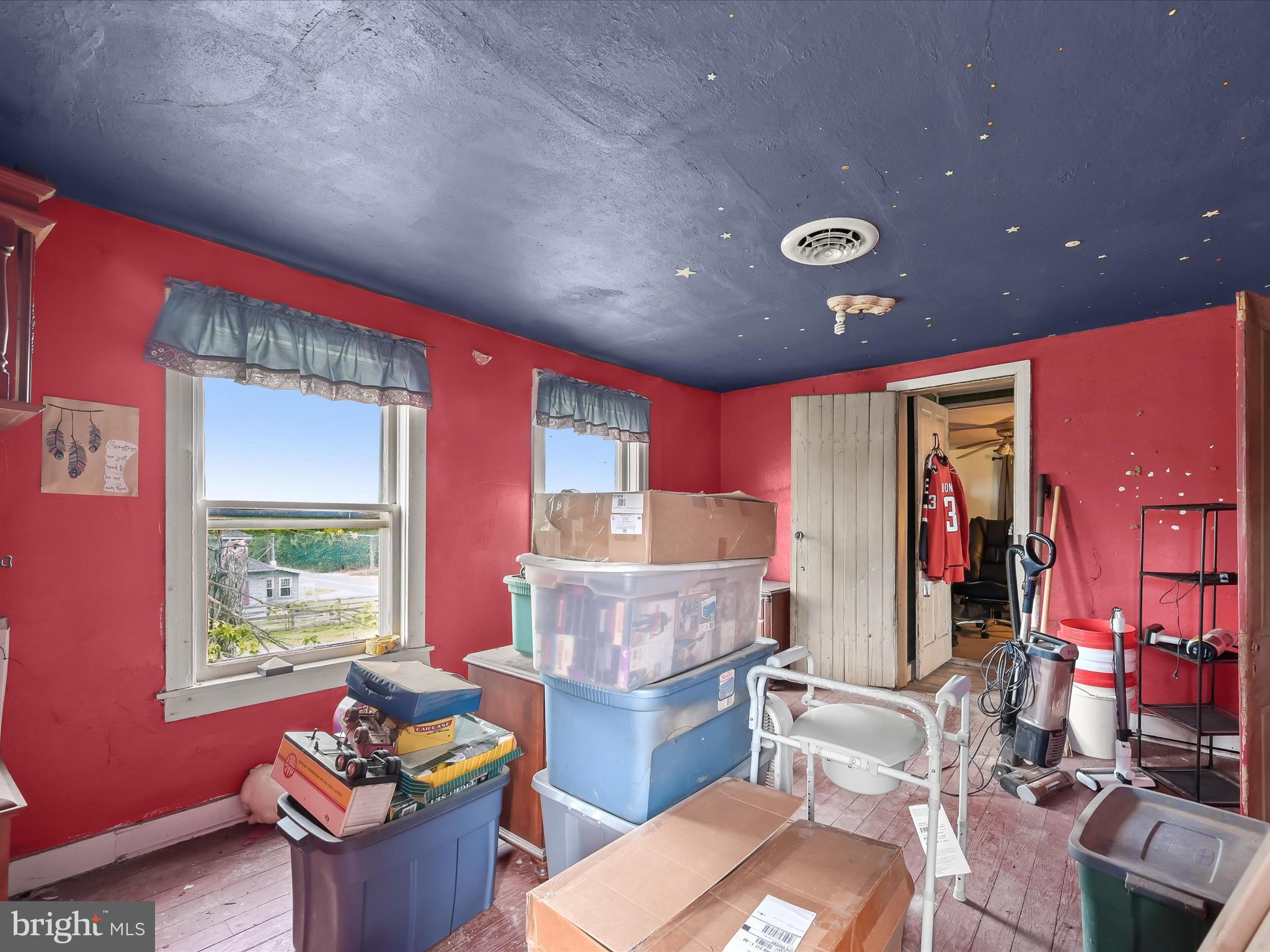430 Bucher John Road Union Bridge, MD 21791 - Photo 32 of 40 a living room with furniture a window and a chandelier