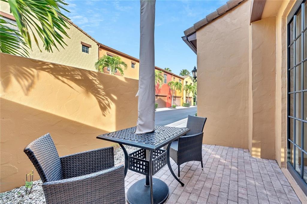 9154 Chula Vista Street, Unit 1331 Naples, FL 34113 - Photo 14 of 25 a balcony view with a seating space